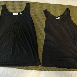 Two women’s black tank tops.